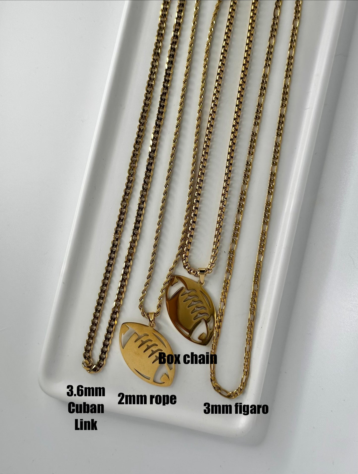 Gold stainless football on choice of chain