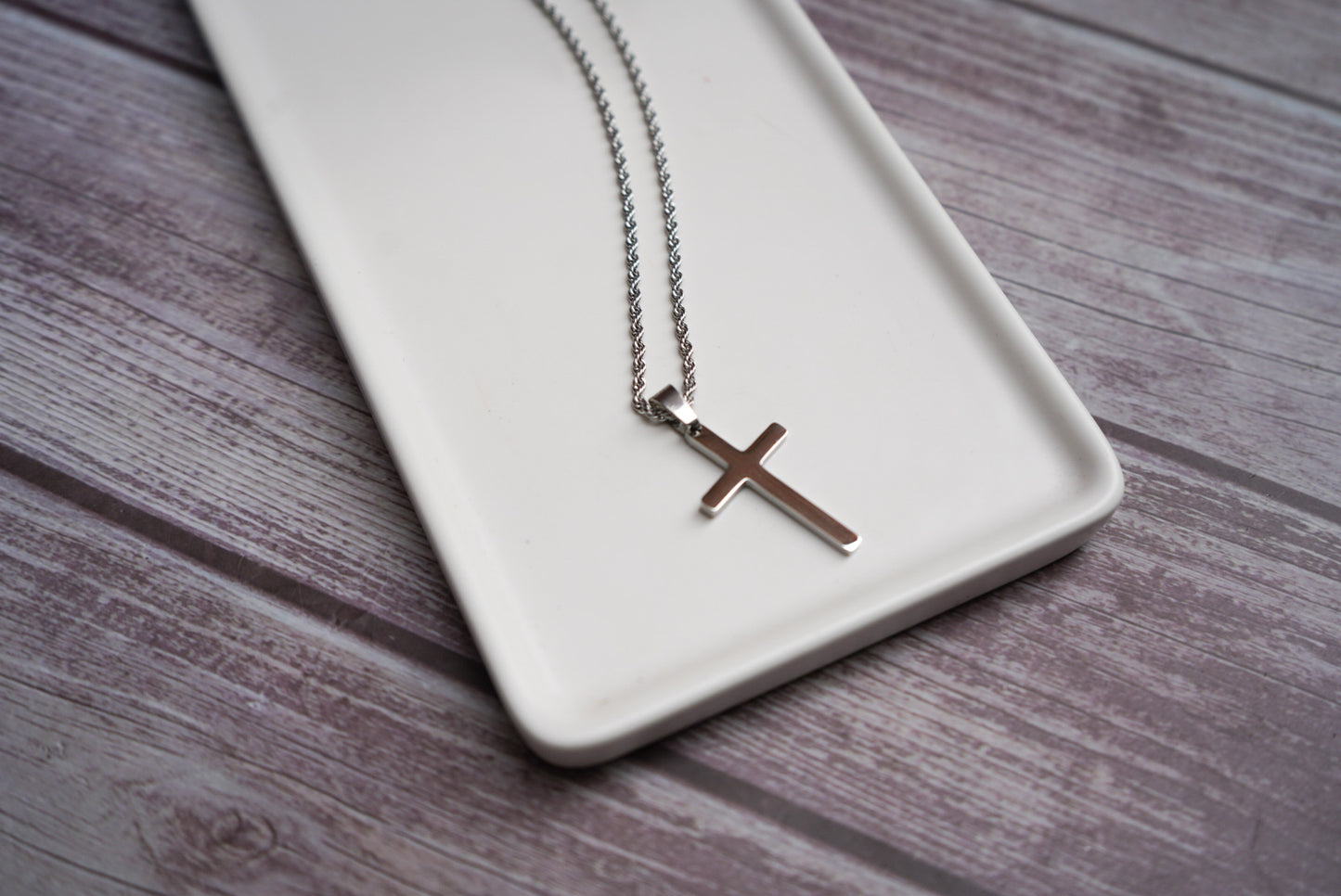 Stainless cross on rope or figaro