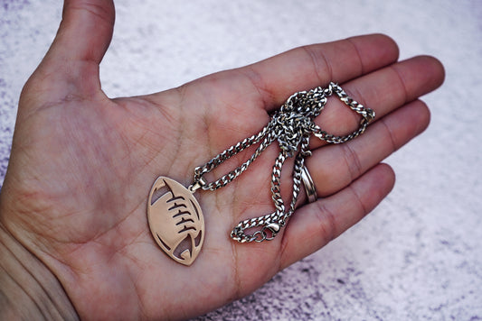 Football on cuban link stainless chain