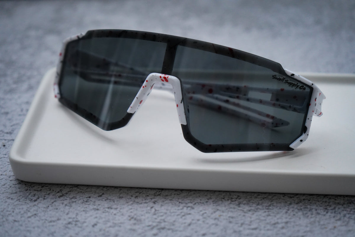Large youth white rimless sports sunglasses w/ red & black speckles (age 9-14)