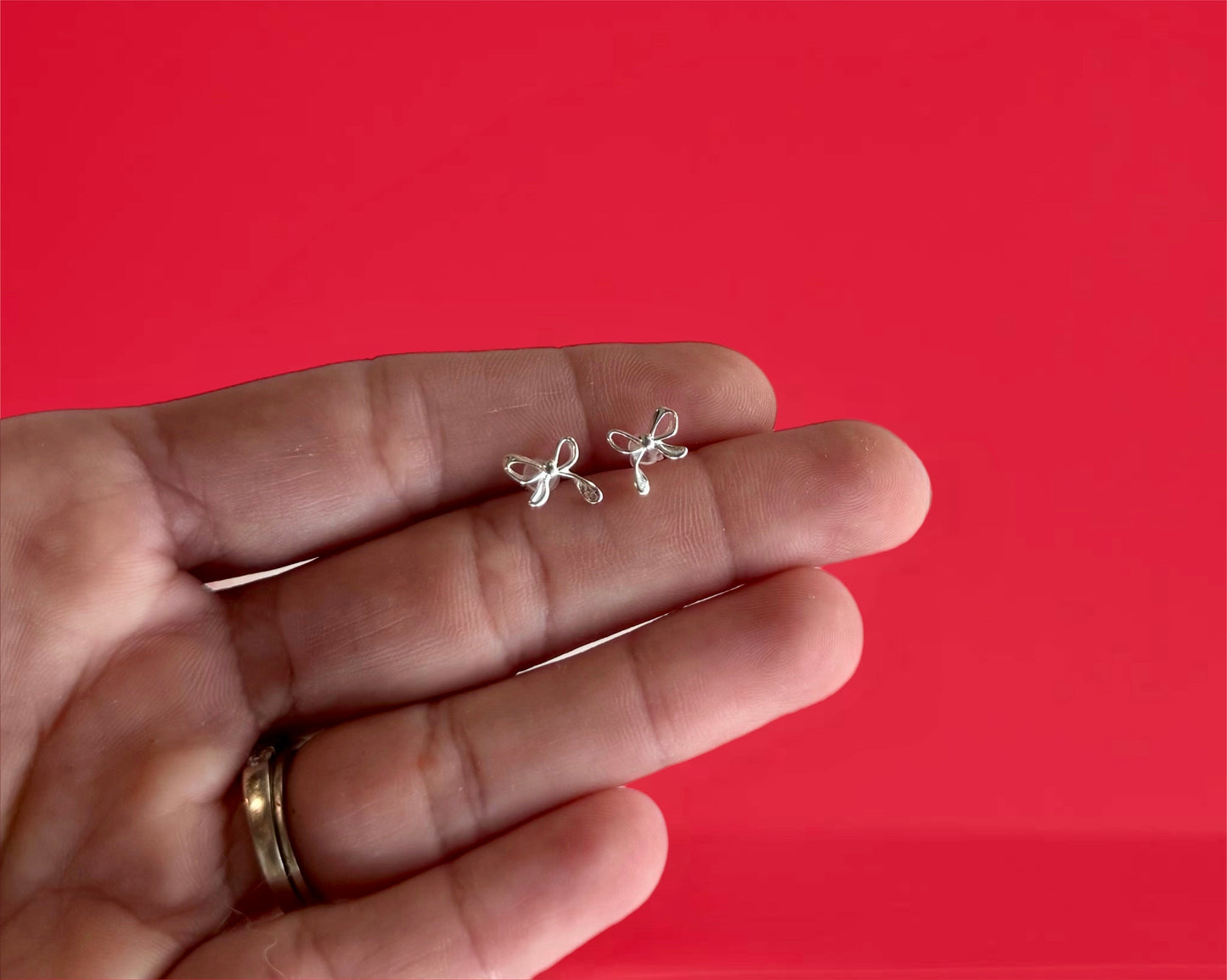 Sterling silver bow tie earrings