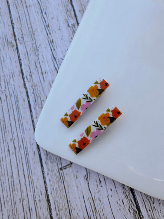 Orange floral alligator clips