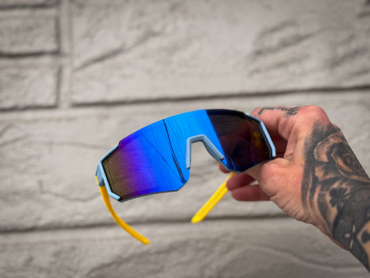 Kid’s blue rimless sports sunglasses with yellow lens (ages 2-9)