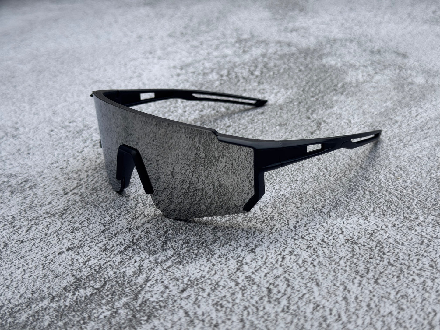 Black sports sunnies w/ silver lens