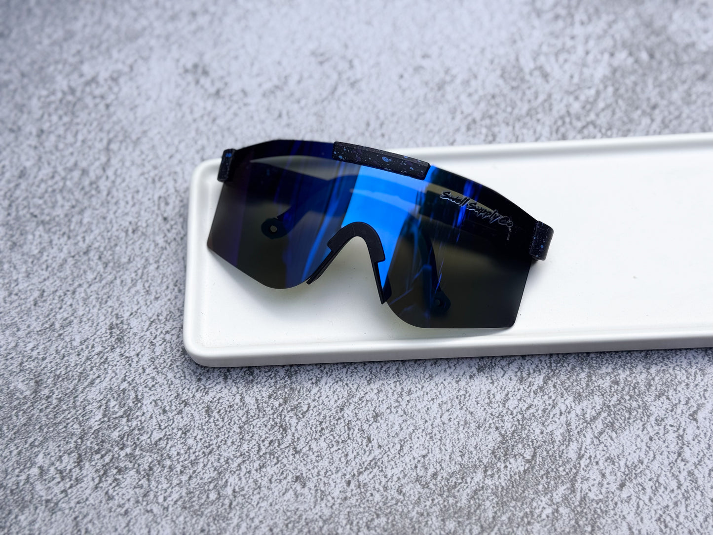 Kid’s black swell vipers w/ purple & blue specks