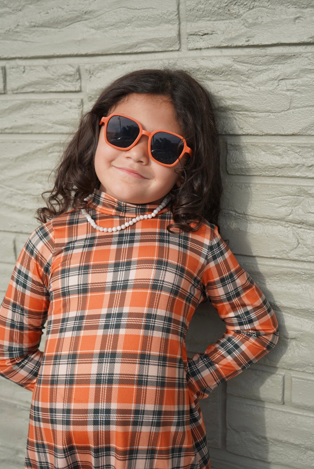 Kid’s muted orange & black square sunnies