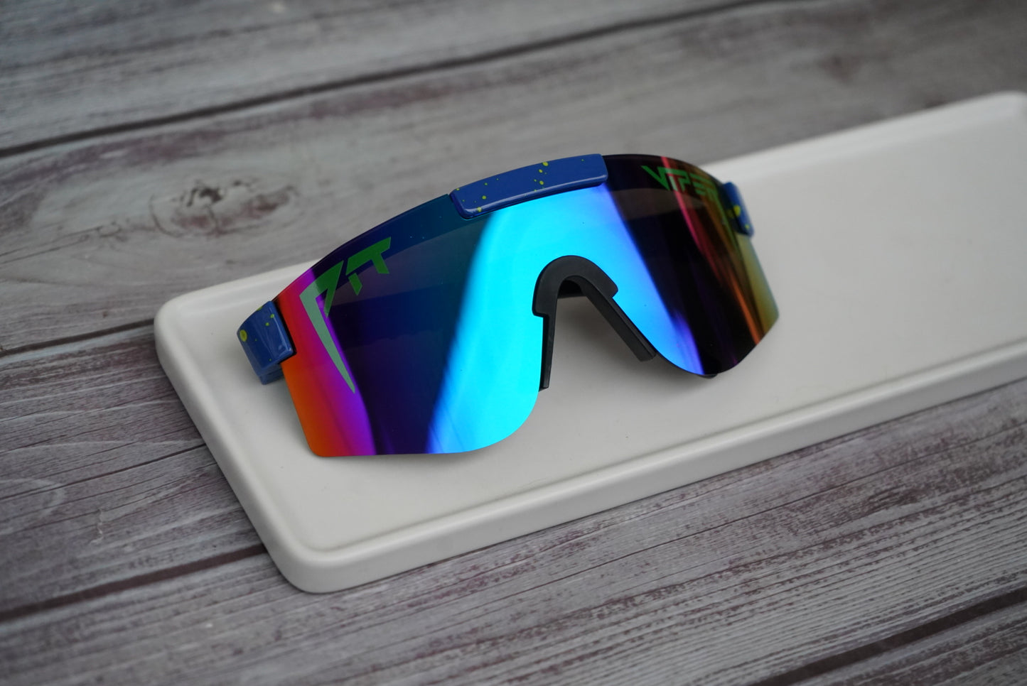 Youth blue mirrored pit vipers with yellow specks