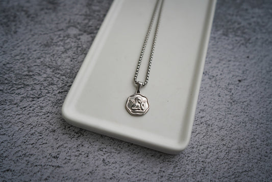 Cupid on stainless steel box chain
