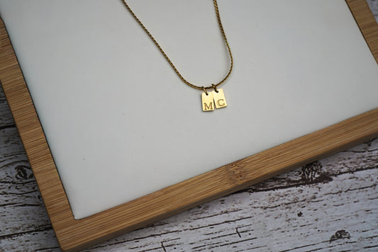 Dainty stainless gold initial tag necklace